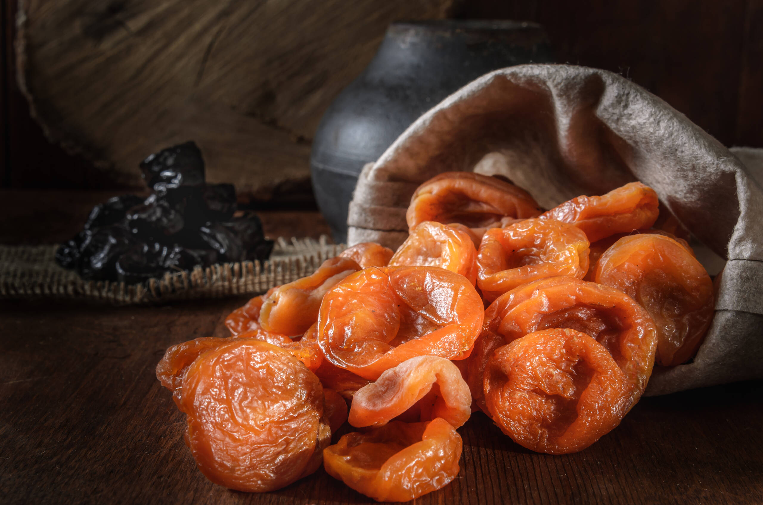 dried apricots in a woven bag