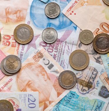 us-dollars-euro-sterling-and-turkish-liras-coins-o-2021-12-23-17-52-13-utc
